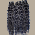Flourish Beauty Raw Indian Curly Hair collection featuring 100% unprocessed raw human hair with defined natural curls, full volume, and luxurious texture.