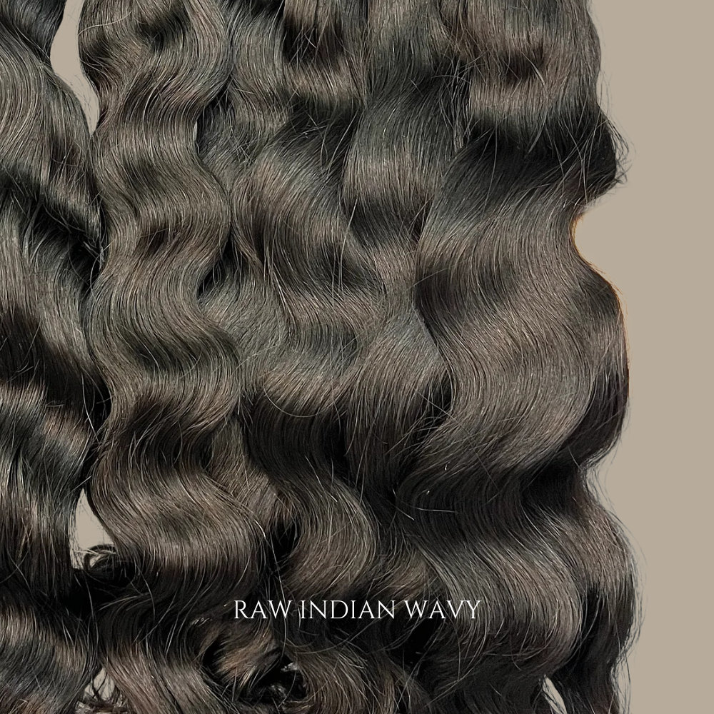 Raw Indian Wavy Hair Extensions made from 100% unprocessed human hair with natural waves, soft texture, and luxurious volume.
