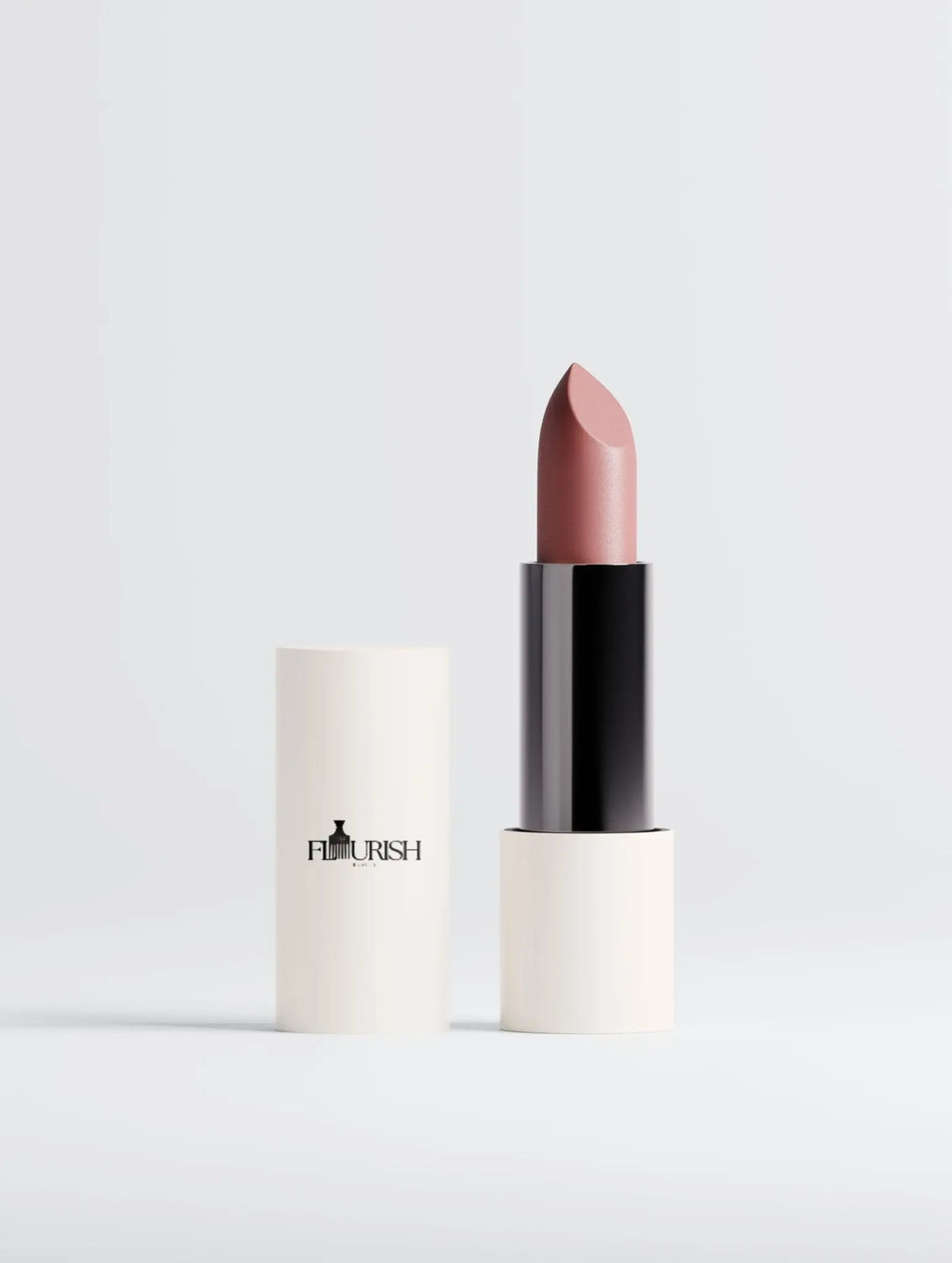 Luxury vegan matte lipstick in Terracotta Nude with velvet satin finish and rich pigment
