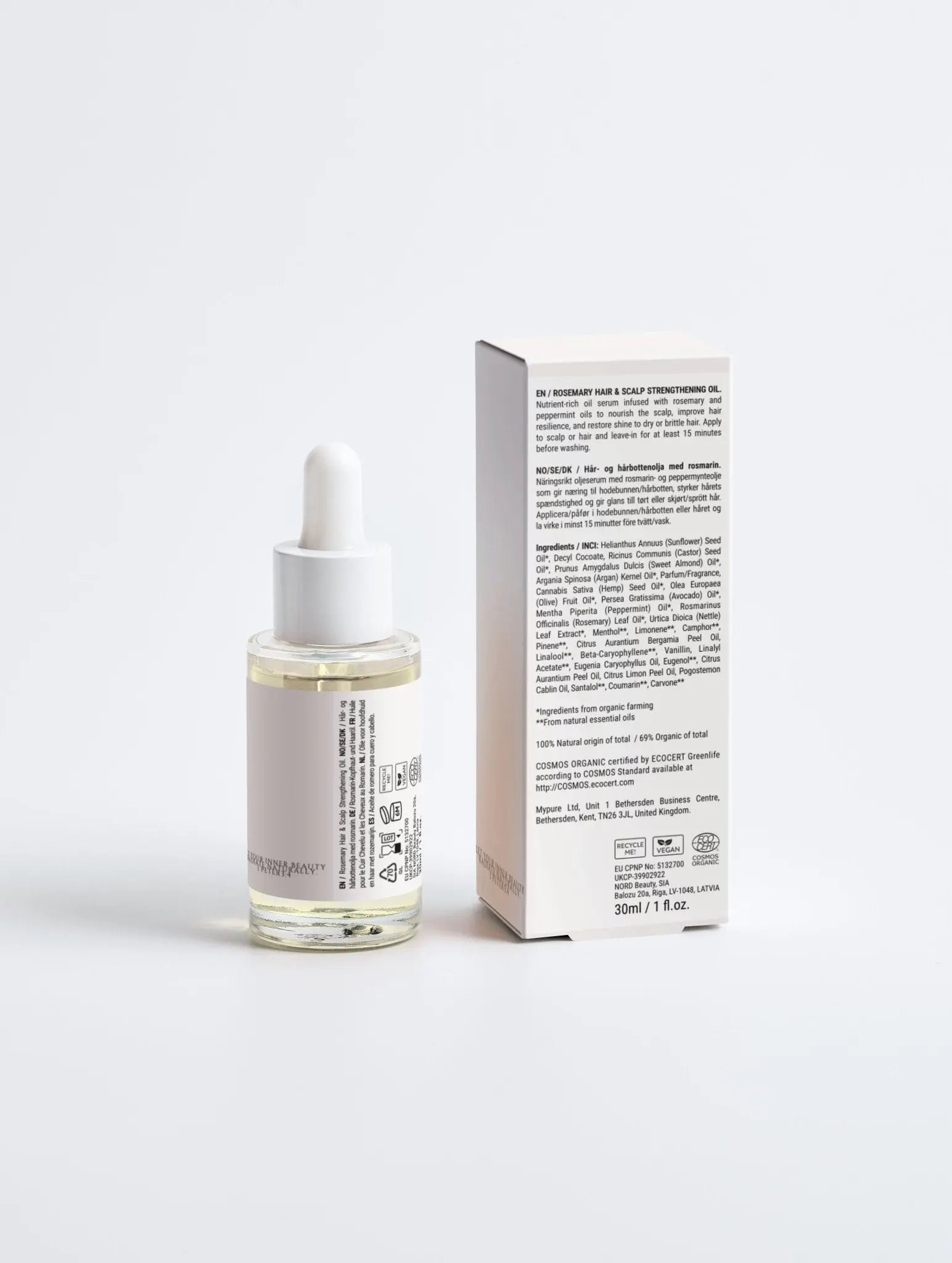 Nourishing scalp oil with rosemary and peppermint for healthy shiny hair
